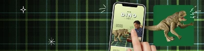 A parent scrolls through the digital kids' catalog on a mobile device and taps on dinosaur toys to add to their child's wish list.